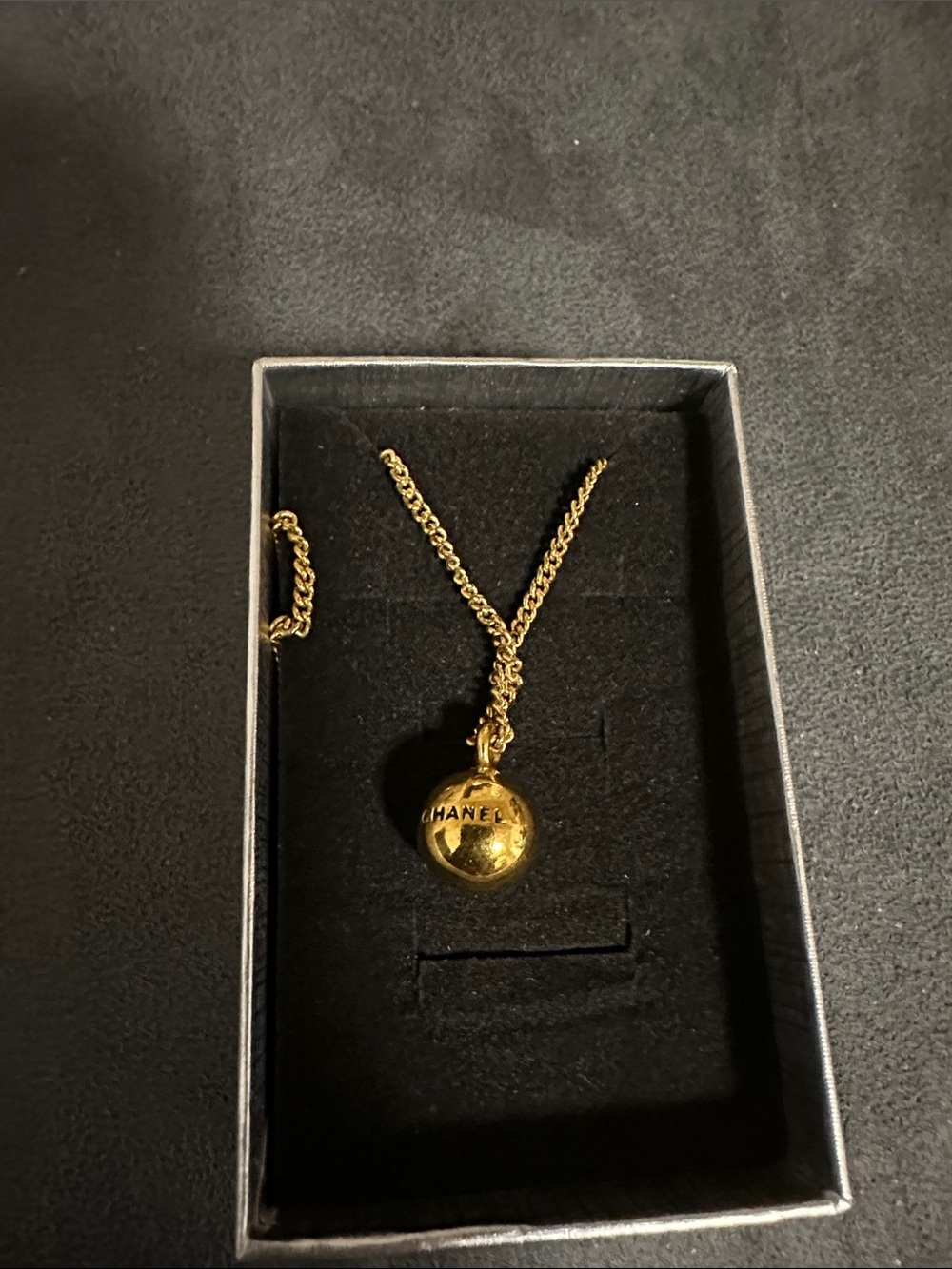 CHANEL Gold Tone Globe Pendant Necklace